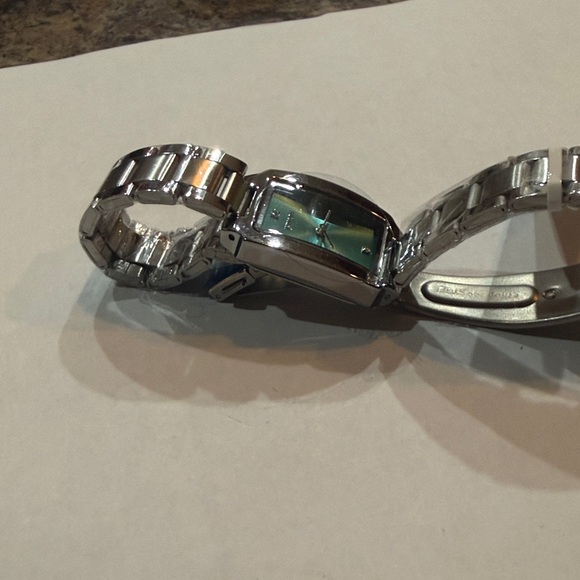 #31 Invicta Silver Wildflower Watch with Teal Face - Picture 5 of 6